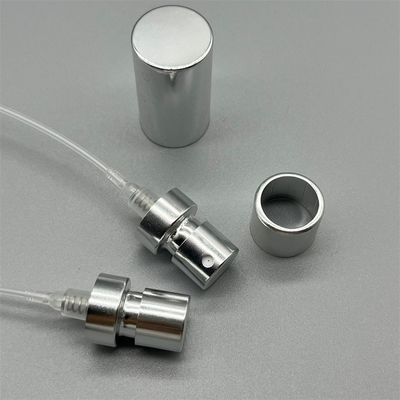 Elegante zilveren parfumpomp met kap Stylische parfumverdeler